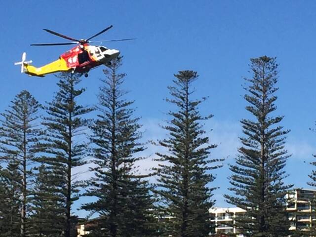 The Westpac Rescue Helicopter Service arriving at Oxley Beach.