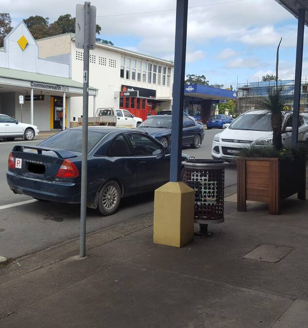Wrong way: This driver was in a hurry to secure a park.
