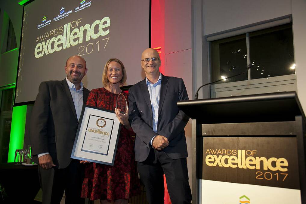 Photo of Award Winner Sarah Garrett from Laurieton Residential Resort with Theo Whitmont and awards host James O'Loghlin. Photo: supplied