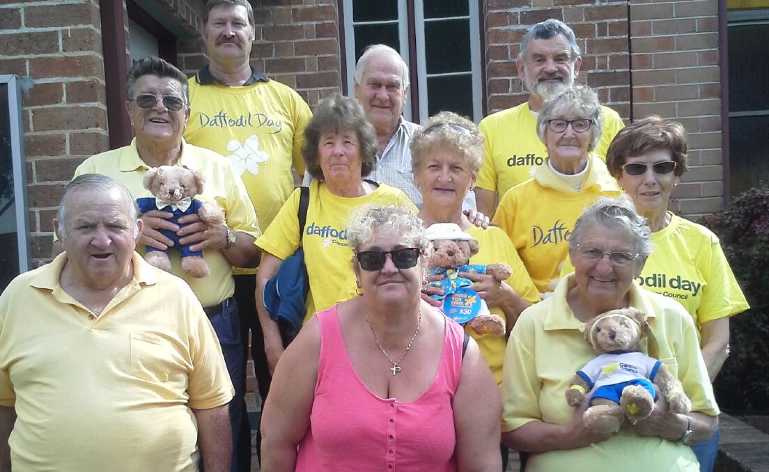 Daffodil Day: Bruce, Barry, Terry; Peter, Rita, Shirley, Rosemary and Bob , Jo and Thelma ready for Friday's very popular and successful Daffodil Day in Wauchope.