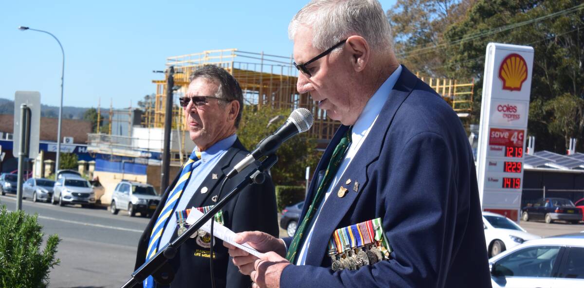 Long Tan: Wauchope RSL Sub-branch member Ray Knapp listens Mal Butler delivers the address at Vietnam Veterans Day service on Thursday.