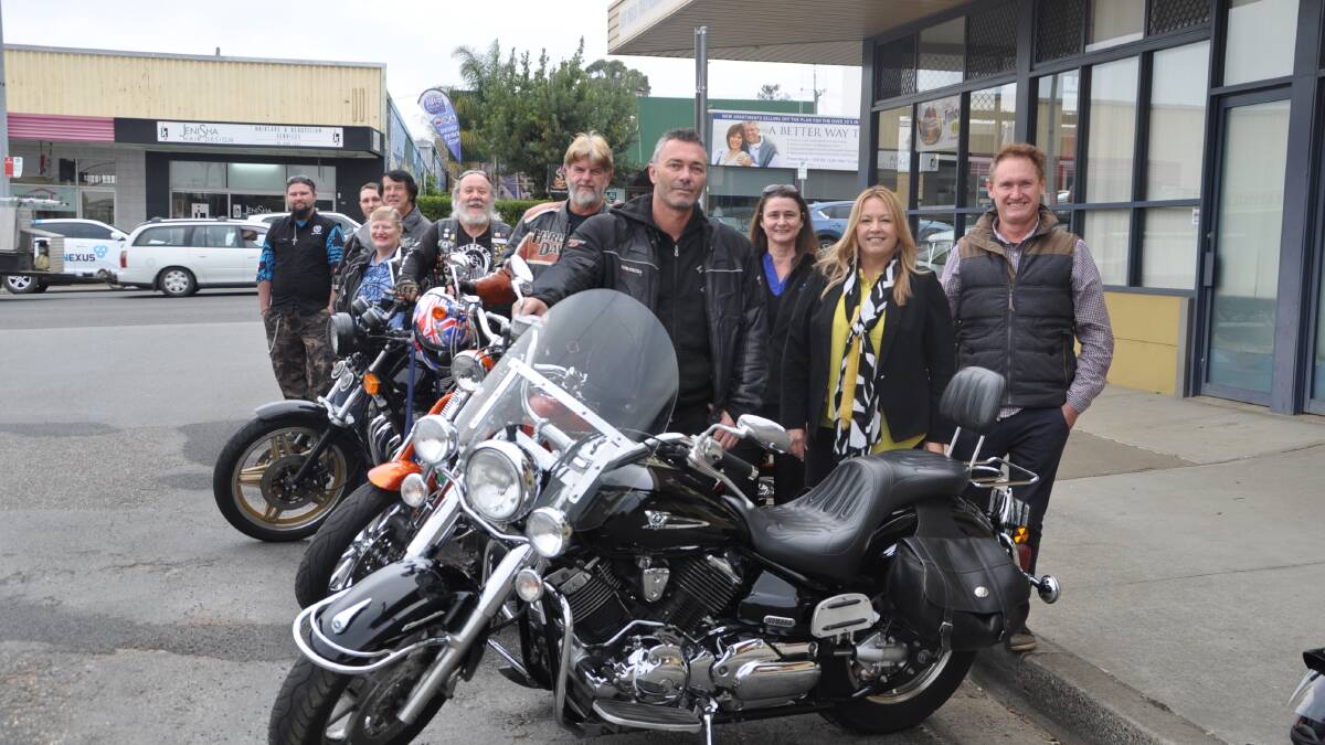 SPACES FOR BIKES: Motorcyclists join Mayor Peta Pinson and Wauchope Chamber president Gary Rainbow (far right) to welcome the council initiative.