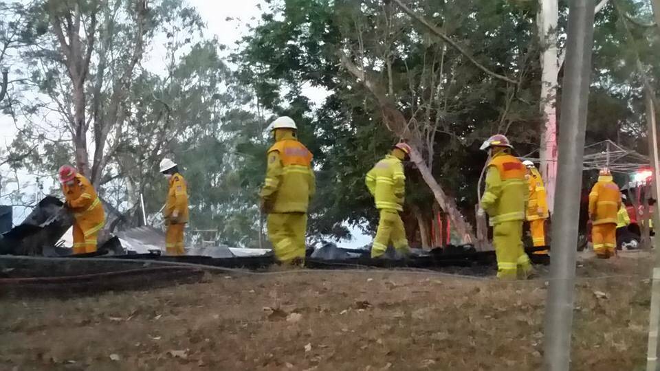 Volunteer firefighters at the blaze at the Keatons' home in Tom Creek.  Photo courtesy of Wauchope Rural Fire Brigade.