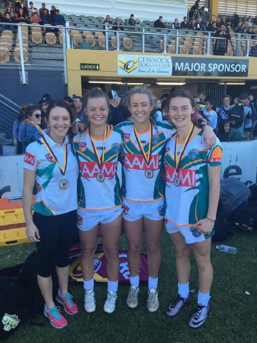 MAKING A SPLASH: Wauchope girls who represented the East Coast Dolphins in Cessnock were Nat Hurrell, Larissa Ward, Kristy Roods and Emily Lester.