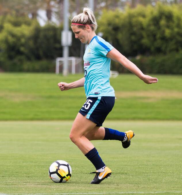 Hard work: Caitlin Cooper hasn't given up hope of reclaiming her Matildas starting jersey.