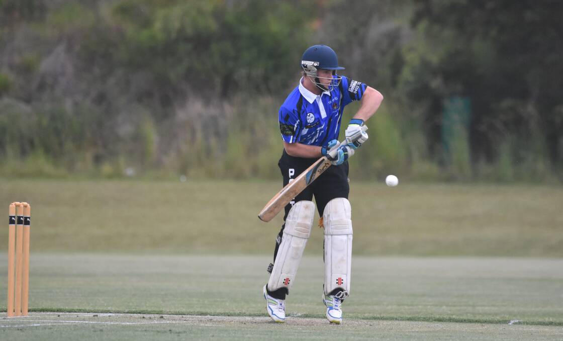 Focused: Jamie Carroll keeps his eye on the ball during the Port Pirates' May Kelly Cup clash with Macquarie. Photo: Paul Jobber