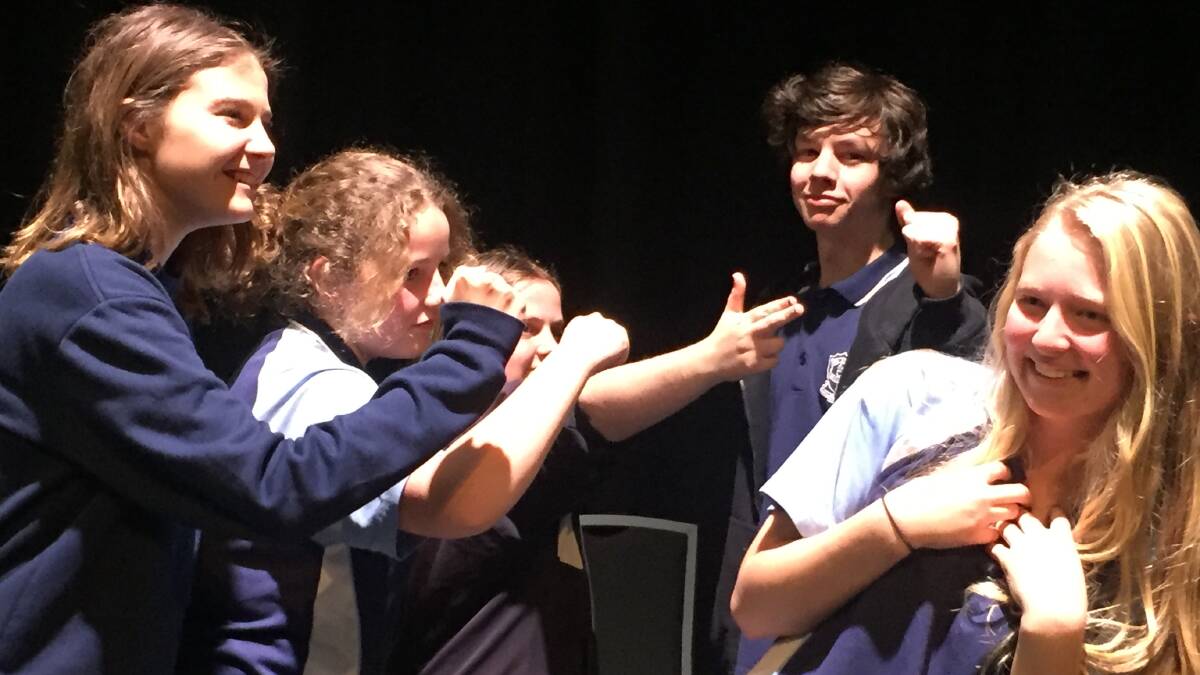 Dramatic effect: Wauchope High School students Shauna Pope, Baili Atkins, Rachel Schmitzer, Finn Lawrie and Emmia Brittliffe demonstrate an acting exercise during a Bell Shakespeare regional access workshop.