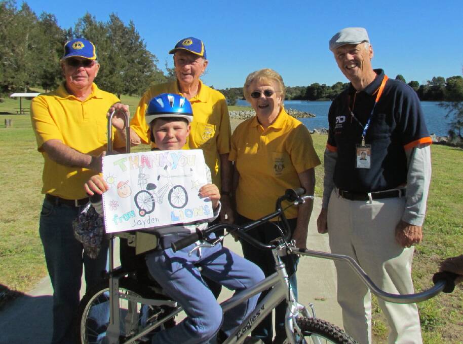 Team effort: Jayden Stainforth with Lions Club of Wauchope members Jim Munro, Bruce Cant and Hazel Fraser, and TAD volunteer John Brumby at Rocks Ferry Reserve.