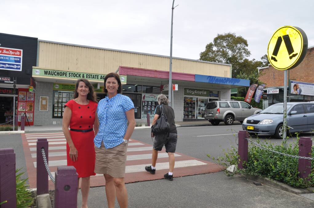 Safety: Cr Sharon Griffiths, left, and Oxley candidate Melinda Pavey at the "central" pedestrian crossing in Wauchope, likey to be the focus of the State Governmet-funded upgrade.