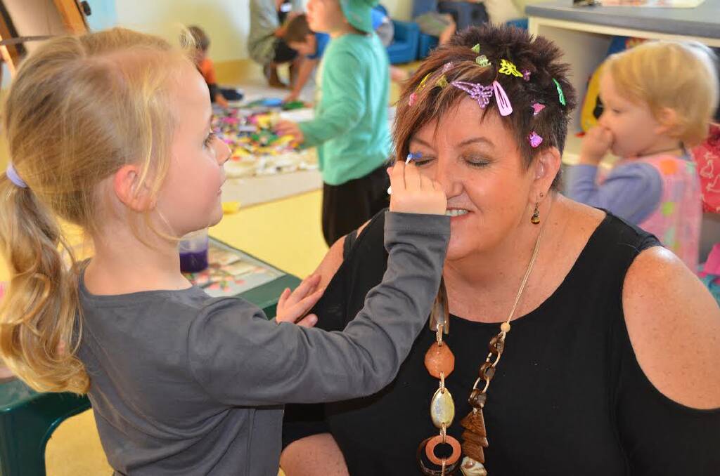 Pampered: Makayla Smith has given her nanna Lyn some stylish hair decorations.