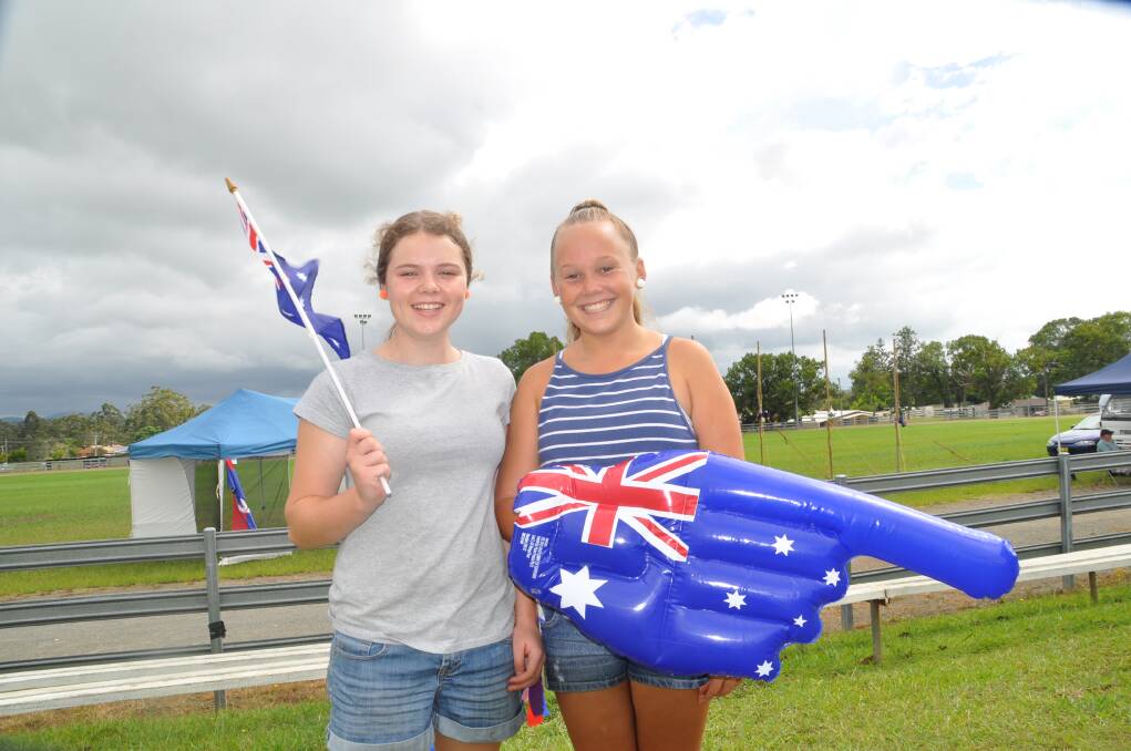 Unflagging: Grace Kucera, left, and Piper Thompson had big Australia Day smiles.