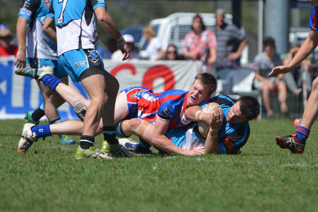 Scott Grant tackled by Dylan Hemsley