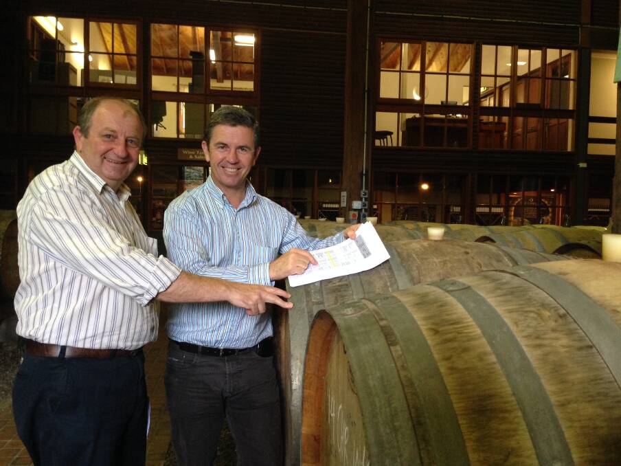 Excited: Wine maker John Cassegrain, left, and Member for Lyne David Gillespie discuss the new concessions negotiated for Australian exports to Japan and Korea.