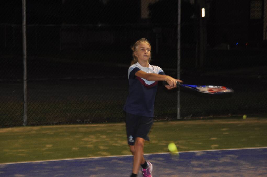 Netting some practice - Jessica Eggert getting to grips with a racket at Wauchope's refurbished tennis courts