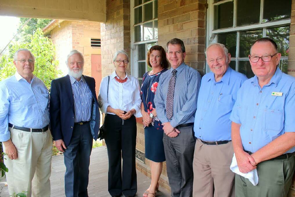 Smiles say it all: Hastings Gateway Inc members (l-r) Don Neal, George Hegarty, Eva Goor, Peter Murphy, Ray Cooper and Ian Conley with Member for Oxley Melinda Pavey.