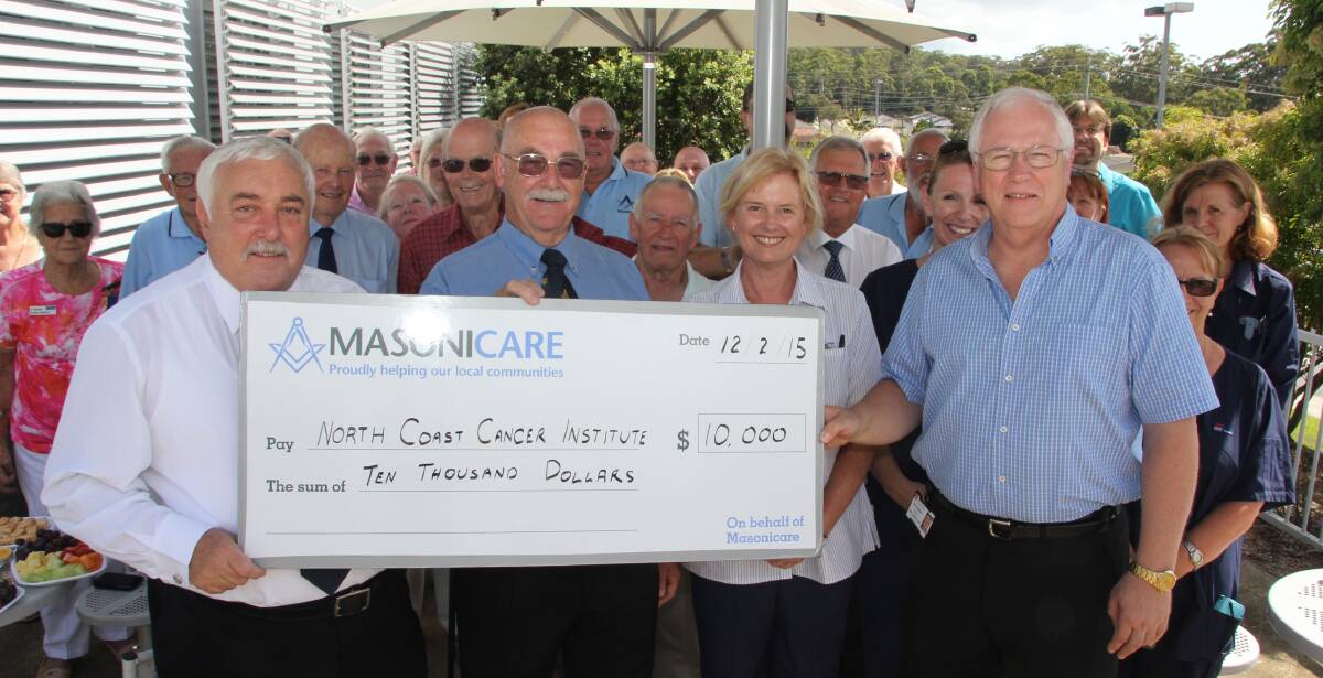 Community help: Mid North Coast Cancer Institute Nurse Unit Manager Jenny Baroutis (second from the left, back) with the Lodge Star of Wauchope representatives who helped raise $10,000 for the Paediatric Cancer Trust - (front) Harry and Hazel Lavender, Julie Gillard, (back) Doug Machin, Graham Gillard, Frances Drysdale and Rod Dark.