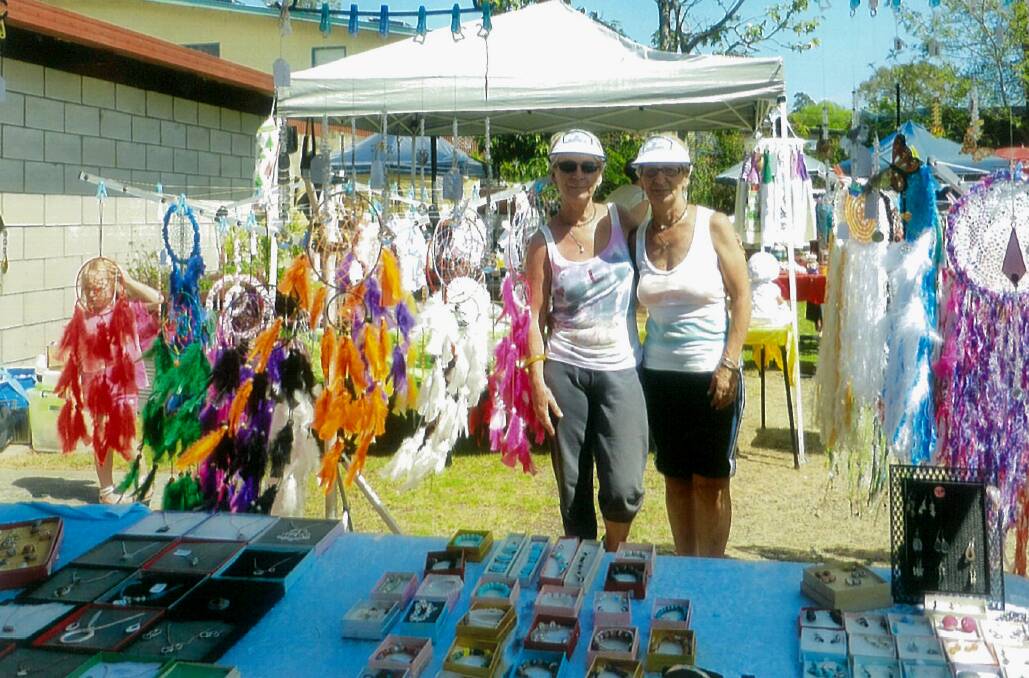 Sister act: Sisters Lynne and Jo with their display of dream catchers and jewellery available at the Wauchope Community Markets