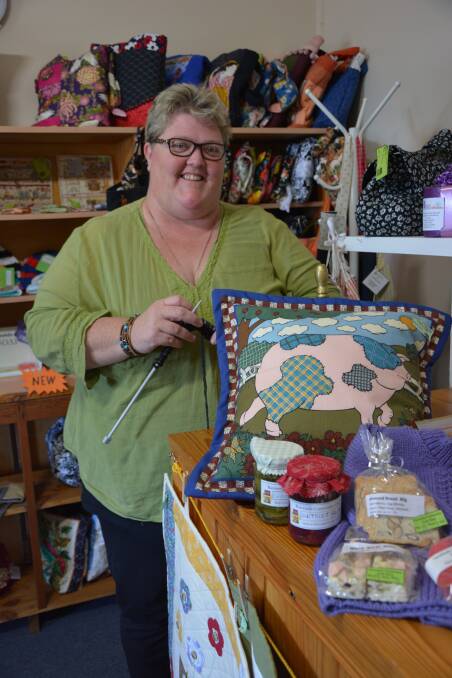 Crafty: Karoonda Community Craft Shop treasurer Tanya Pilgrim shows off some of the wares made my community members, including herself, which can be found at the shop.