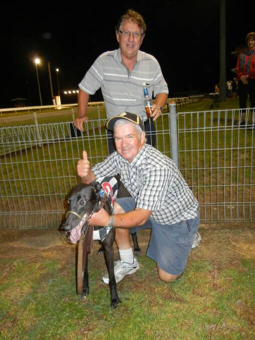 Strong win: Trainer Gavin Maunder is congratulated by breeder Roger Hale after Mighty Alice's maiden victory at Wauchope on Saturday night.