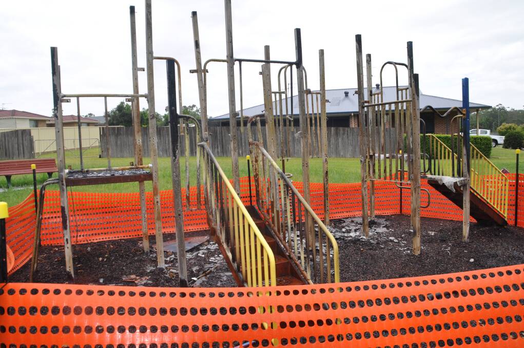 Destruction: The burn-out playground equipment at the Timbertown Crescent reserve.
