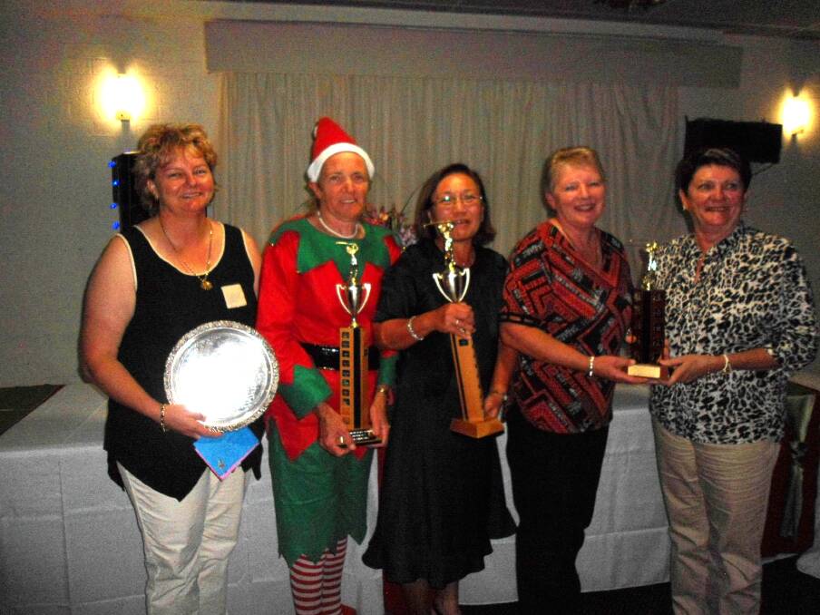 Big night: Wauchope Lady Golf winners of 2014 being presented with their trophies on Presentation Night, from left, Club Champion Jane Horne, Div II winner Mary Harrison, Div III winner Giang Duong and Foursomes winners Lyn Hobson and Lyn Kelly.