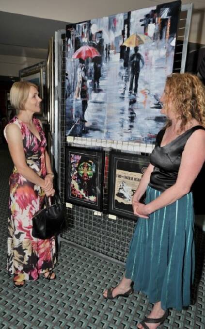 High standard: Last year's Mid North Coast Open Art Prize winner Vanessa Newell with her painting, Rainy Evening, and judge Jane Hosking