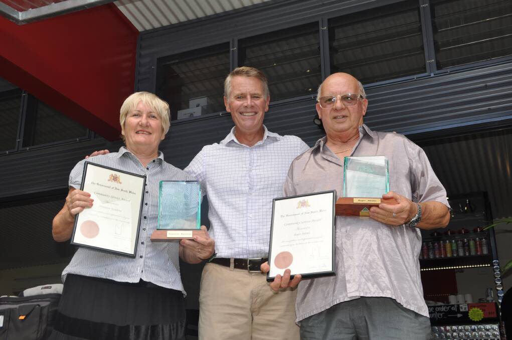 Prestigious: The NSW Government Community Service Award winners from Wauchope, Mrs Jeannette Rainbow and Roger Adams, (far right) with The Hon. Andrew Stoner, Member for Oxley at the presentation ceremony on Monday morning.