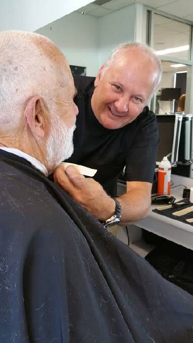 No regrets: Daniel Becroft practices his new-found trade of barbering.