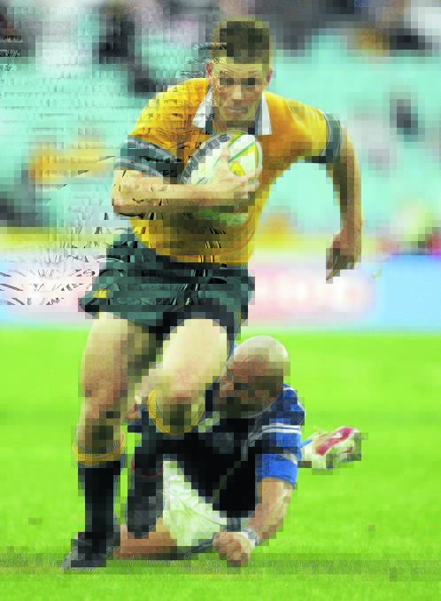Clyde Rathbone of the Wallabies in action during the Bundaberg Rum Test Series between the Australian Wallabies and Manu Samoa held at Telstra Stadium June 11, 2005 in Sydney Australia. He is set to visit the Hastings.  
(Photo by Adam Pretty/Getty Images)