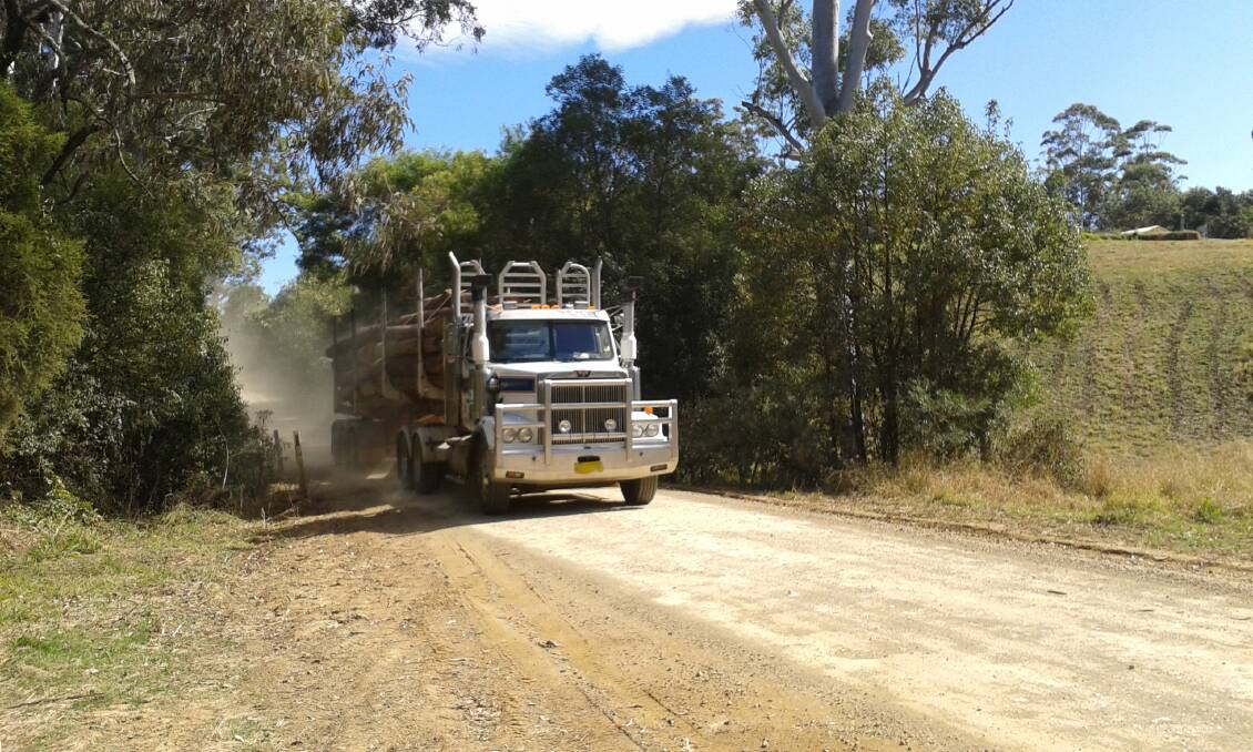 Danger signs: Narrow, unsealed roads and logging trucks are causing safety concerns in Rolland Plains and residents want action.