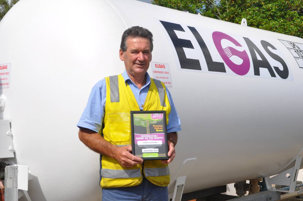 Recognition: The Hastings Co-op's fuel section manager Terry Halloran with the Elgas Distributor/Agent of the Month Award for Excellence at the Co-op's Caltex Lasiandra centre.
