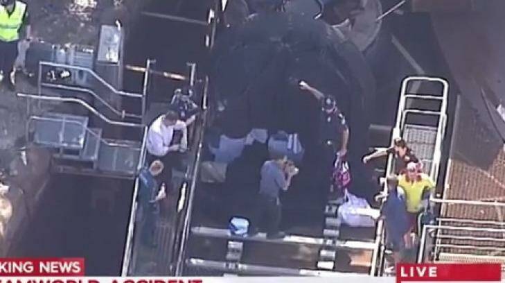 Emergency services workers and police at the scene of the incident at Dreamworld.  Photo: Nine News