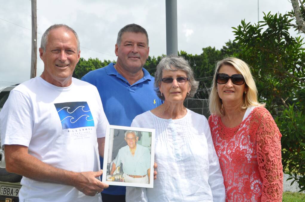 Loving memories: Michael Trotter, Peter Trotter, Nada Trotter and Wendy Laws with a photo of their beloved Alf 'Smacka' Totter at the reserve.