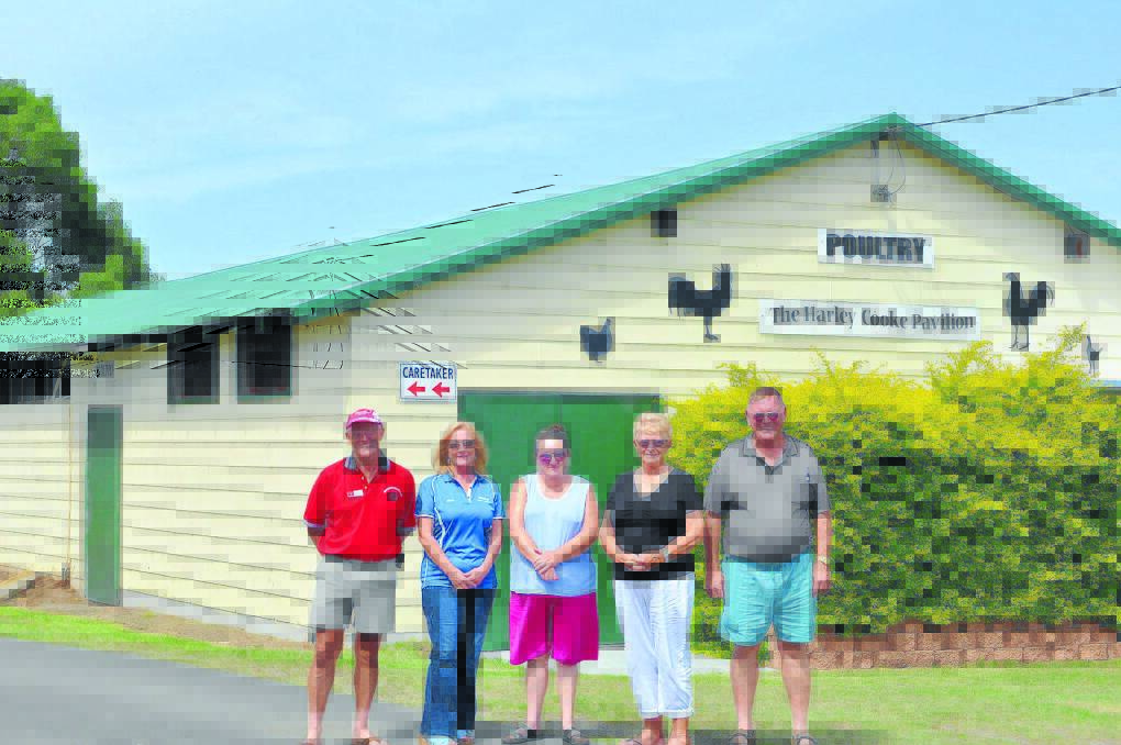 Up to scratch: Looking pleased with the new Wauchope Showground Poultry Pavilion roof are, from left, Poultry Club president and Show Society vice-president Neil Coombes, Show Society secretary Anne Watkins, secretary of the Ladies Auxiliary Trish Douglas, Ladies Auxiliary member and Show Society committee member Doris McKinnon and Show Society president Bob Kennett.