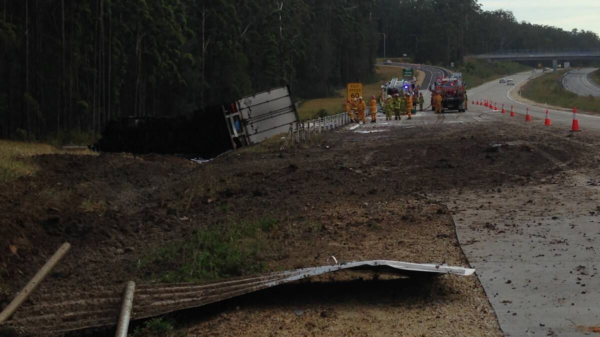 The scene at this morning's fatal truck crash near the Pacific Highway and Bago Road intersection.