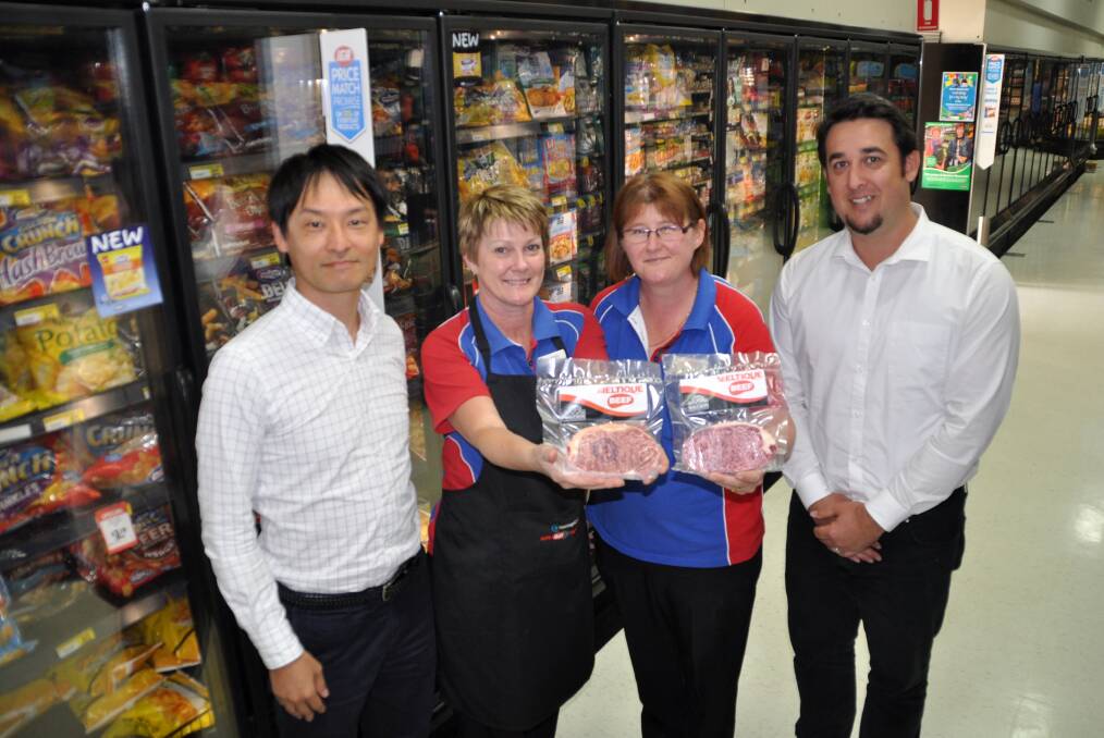 Taste for yourselfe: Hastings Food Processing's general manager Shin Fuyimoto and sales manager Joel Laurie are proud to introduce their 100 per cent beef product to local Supa IGA supermarkets. They are pictured here with Timbertown Supa IGA's store manager Carol Leach (left) and dairy manager Jodee Brownlow.
