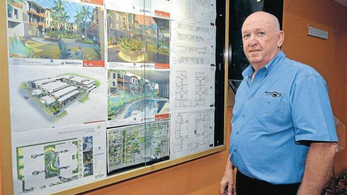Community benefits: Wauchope RSL CEO Wayne Saley with the plans for the new over-55s living units.