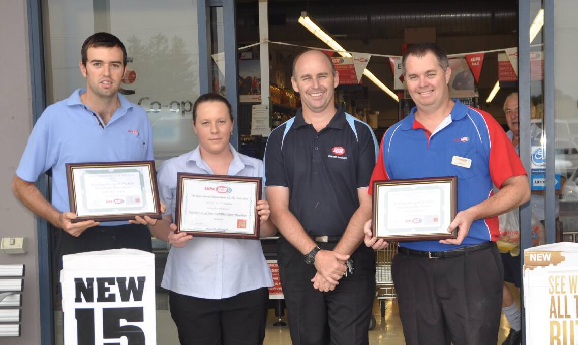 Best efforts: Ben Trommels, Sam Williams, Darren Patridge and Jarrod Eyles from the Wauchope IGA on Hastings Street have received three awards at the IGA Annual Regional Awards.