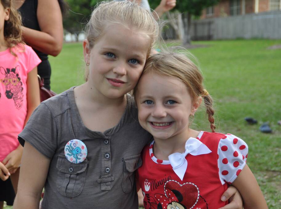 Besties: Ali-May Niall with Emilie Luke at the Wauchope Neighbourhood Centre's Family Fun Day in Bain Park on Wednesday.