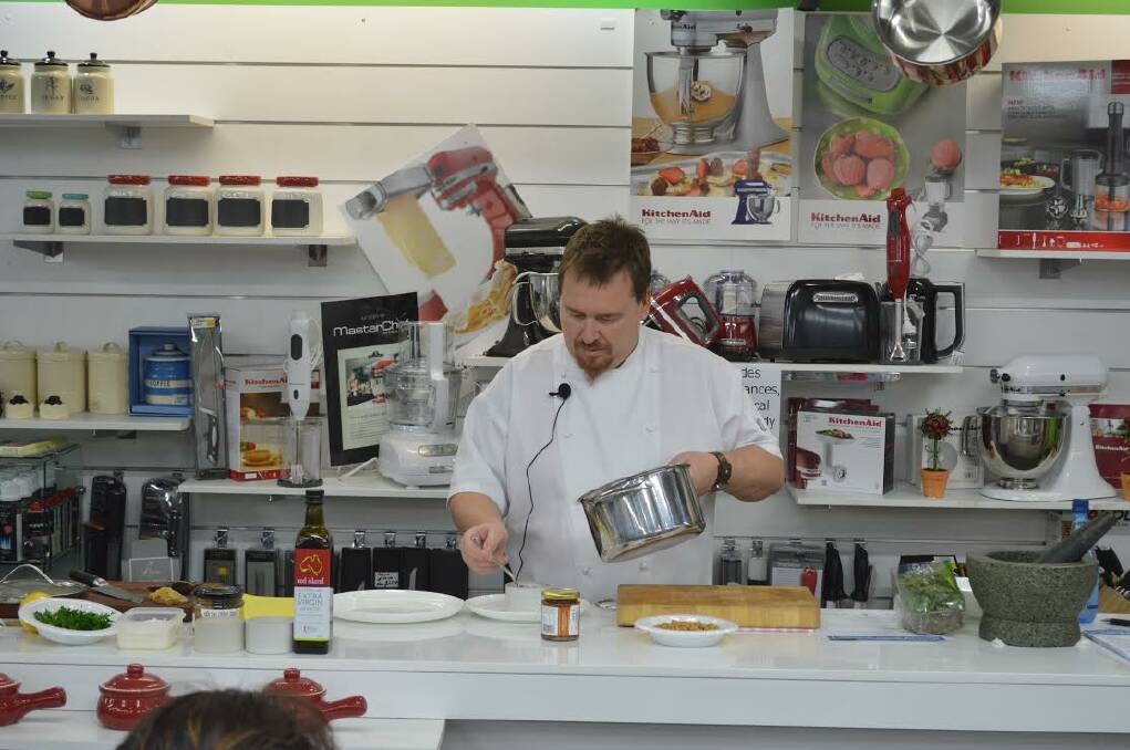 Expert: Michael Schubert, Head Chef from Sails Resort's Spinnakers Restaurant demonstrating with seafood on Saturday.
