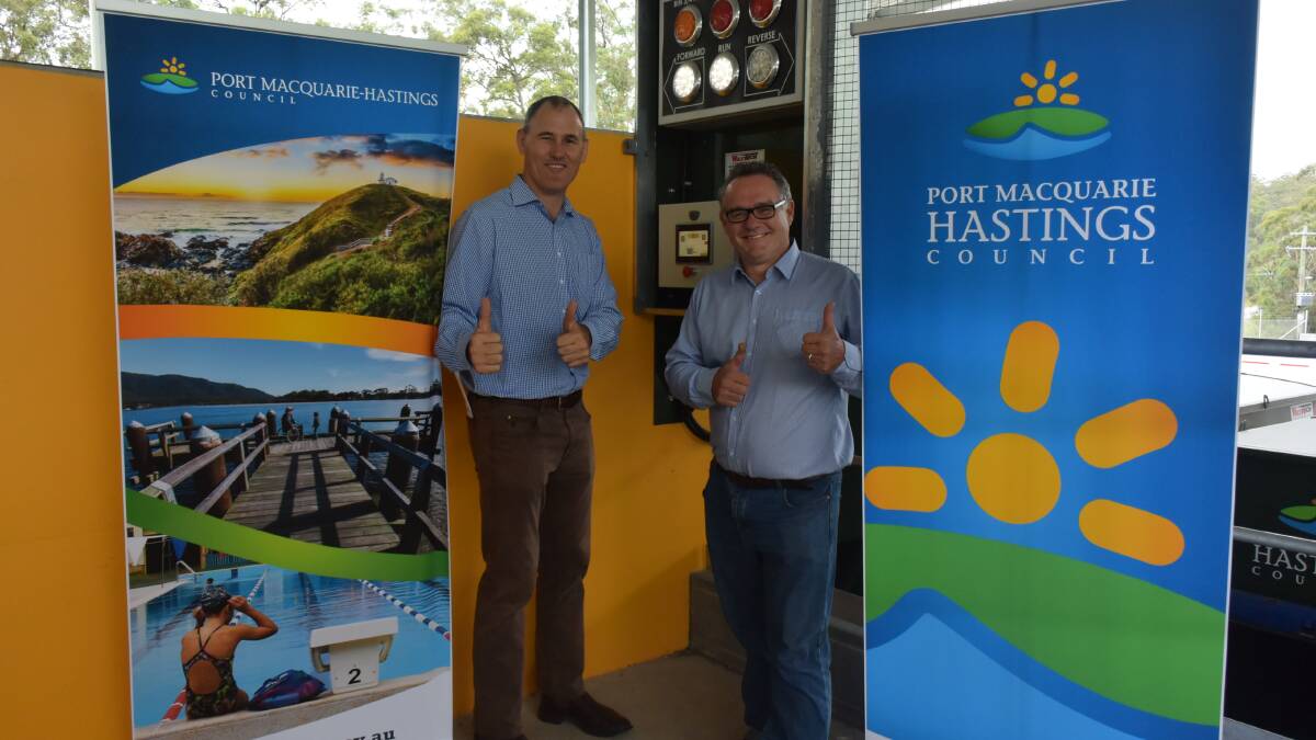 IT'S UP AND RUNNING: Mayor Peter Besseling and councillor Peter Alley at the opening of the Kew Waste Transfer facility on Herons Creek Road.