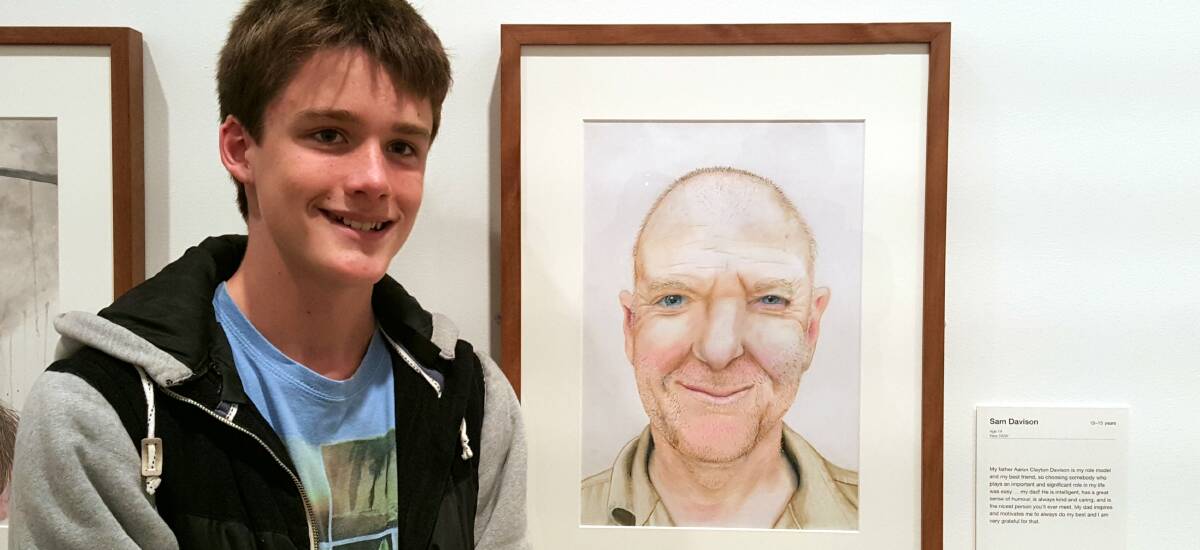 GOOD LUCK SAM: Samuel Davison with the portrait of his father which may earn him a place in Australia's art history.