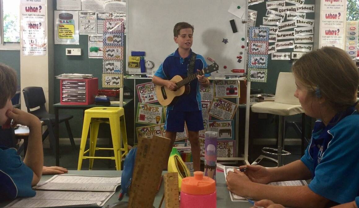 Cameron Alford performs for his classmates.