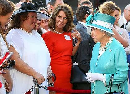 Royal treatment … Rinehart dons a "non-pointy" hat in honour of the Queen in Perth last October.