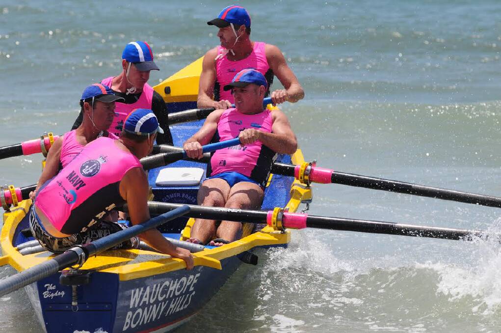 The Big Dog - Above, Wauchope Bonny Hills crew: Bow - Russell Eichman, Tony Kee, Boyd Hetherington, Brandon Armstrong and Sweep Manfred Sontag fight hard in the North Coast Surf Boat Series.