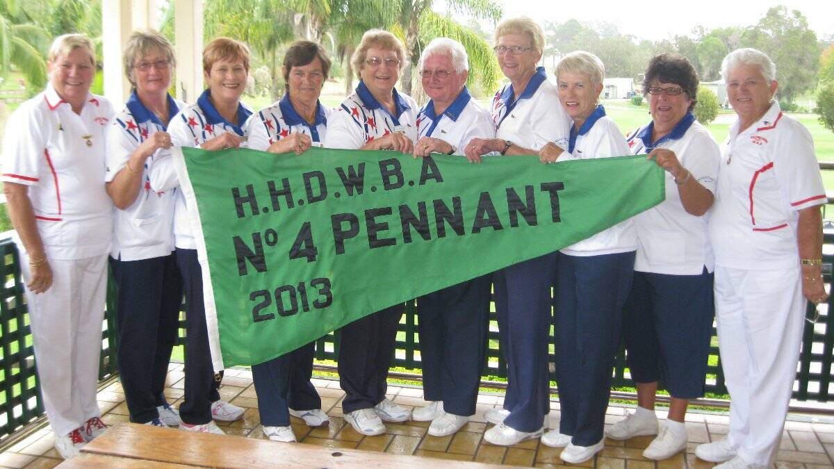Wauchope Women's Bowling Club celebrated its Number 4 pennant victory last week. District secretary Carole Graham and district president, Maureen Bradford handed over the flag. Celebrating the moment are, Carole Graham, Heather Bartlett, Annette Jones, Jutta Hall, Lil Allen, Judy Coombes, Pat Coombes, Tina Hamilton, Rosie Ansley and Maureen Bradford.