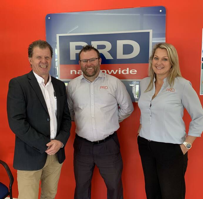 Networking: Simon and Natasha Hancox with PRD franchise managing director, Todd Hadley celebrating the recent re-signing of the franchise agreement.