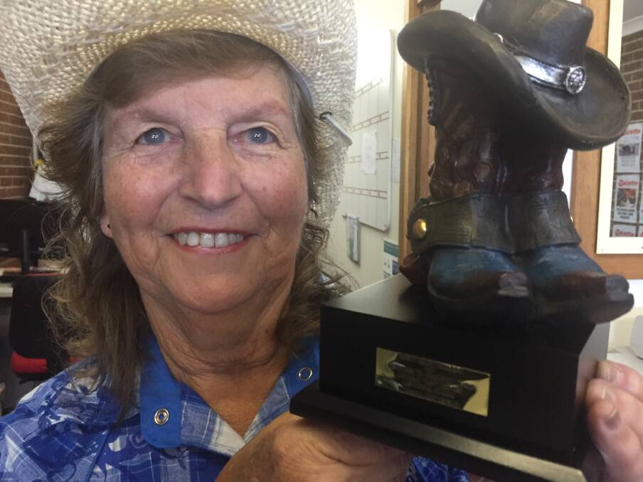 Queen of country: Wauchope's Marcia Armfield Wells with her Dubbo Dusty Boot award for services to country music.