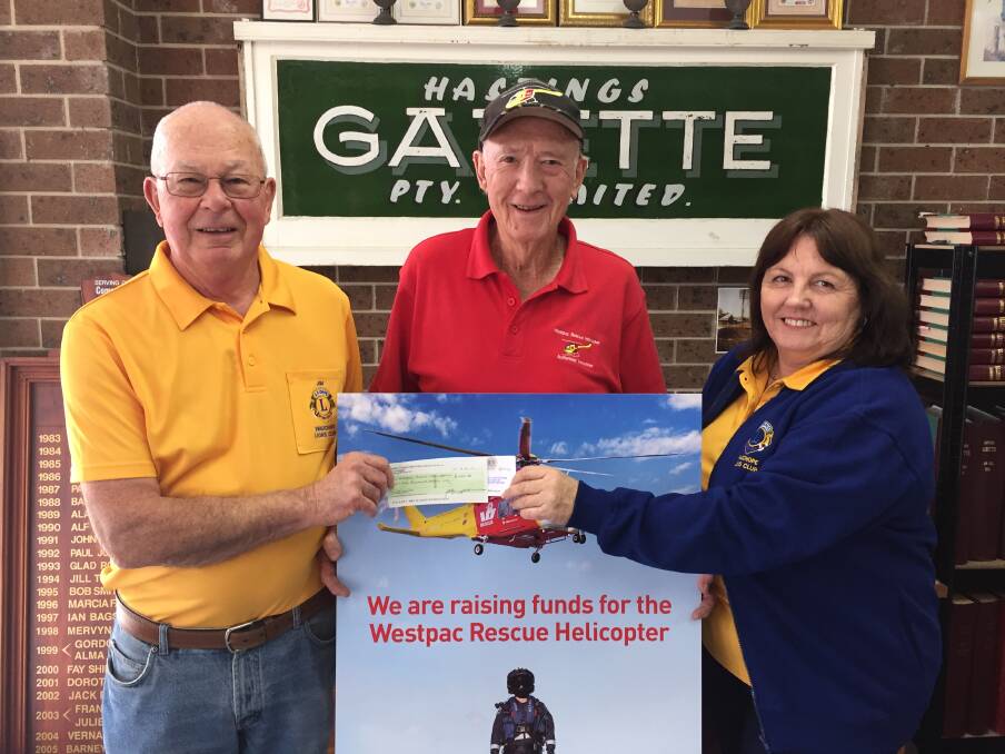 Wonderful: Julianne McHugh and Jim Munro presenting a cheque to Bruce Cant OAM from the Westpac Rescue Helicopter Support Group.