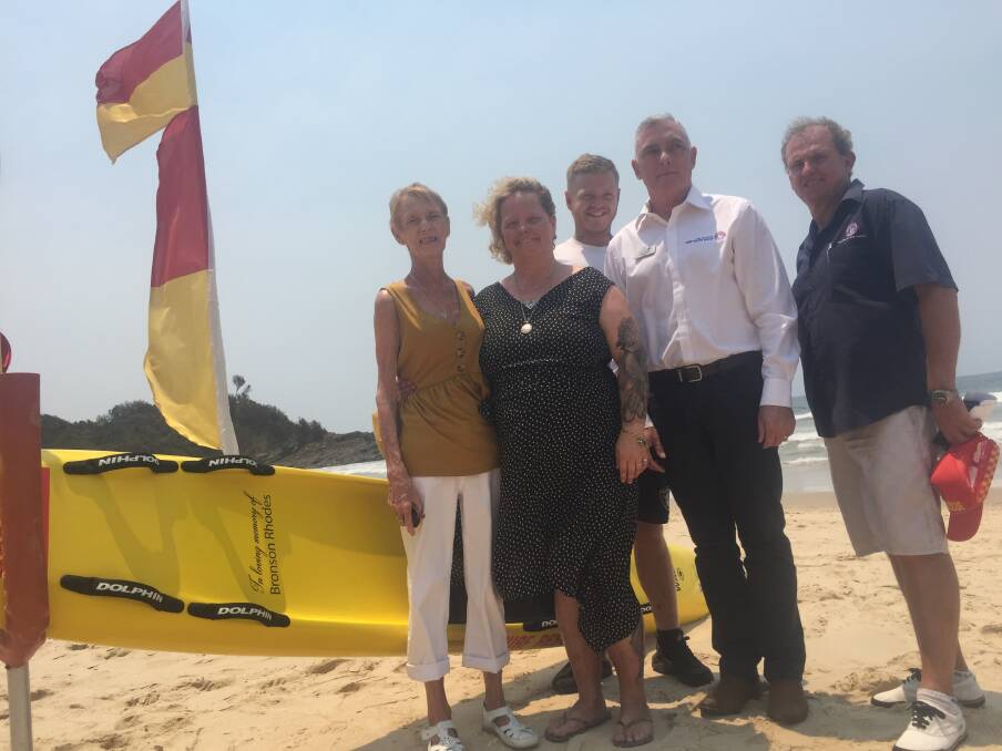 Ongoing support: Bronson Rhodes' grandmother Kathleen Fry, mum Rachel, brother Billy with Surf Life Saving NSW president George Shales and Mid North Coast branch president Rod McDonagh.